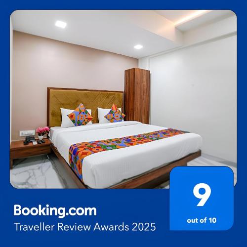 Ένα ή περισσότερα κρεβάτια σε δωμάτιο στο Glitz Hotels - Seven 7 Star
