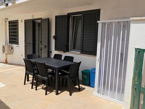 Casa Vacanze AFEA Torre dell'Orso Salento Pugliaにあるバルコニーまたはテラス