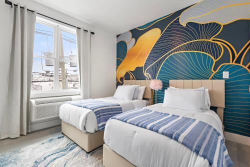 Ένα ή περισσότερα κρεβάτια σε δωμάτιο στο Luxury First , 15 min to airprt, 2m to train NYC