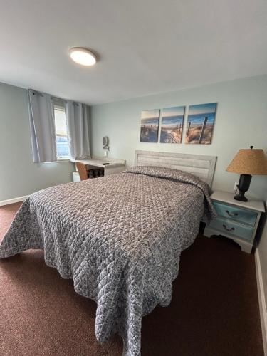 Postel nebo postele na pokoji v ubytování Boulevard Motel