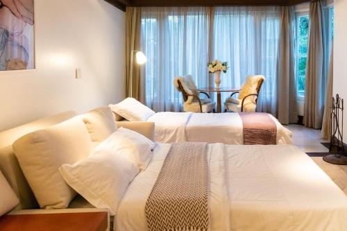 Postel nebo postele na pokoji v ubytování Fantástica Suíte Royal Mountain Village - 2008