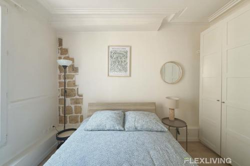Photo de la galerie de l'établissement Flexliving - One-bedroom apartment - Caplat, à Paris