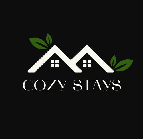 Ein Zertifikat, Auszeichnung, Logo oder anderes Dokument, das in der Unterkunft The Little Green Cosy Cottage ausgestellt ist