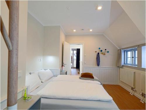 Katil atau katil-katil dalam bilik di Time out Comfortable holiday residence