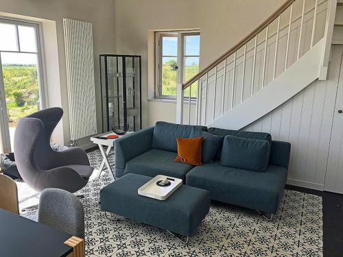 Ruang duduk di Time out Comfortable holiday residence