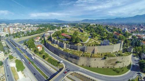 an aerial view of a city with a castle at LION Apartments - DEBAR MAALO in Skopje