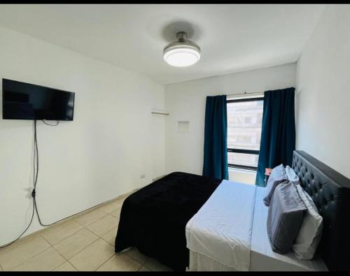 Postel nebo postele na pokoji v ubytování Apart Dos Naciones