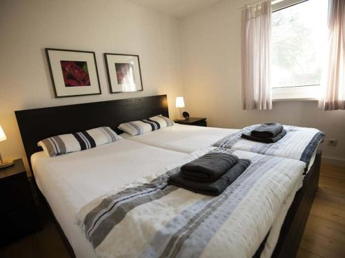 Postel nebo postele na pokoji v ubytování Summer freshness Comfortable holiday residence