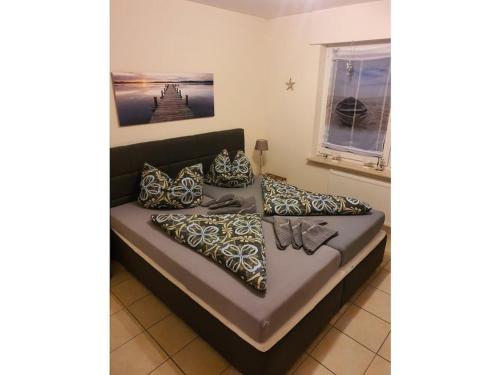 Ένα ή περισσότερα κρεβάτια σε δωμάτιο στο Beach Crab Comfortable Holiday Residence