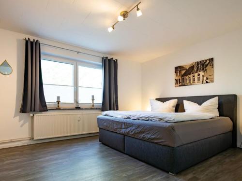 Voodi või voodid majutusasutuse Old Merchant on the Baltic Sea Beach toas