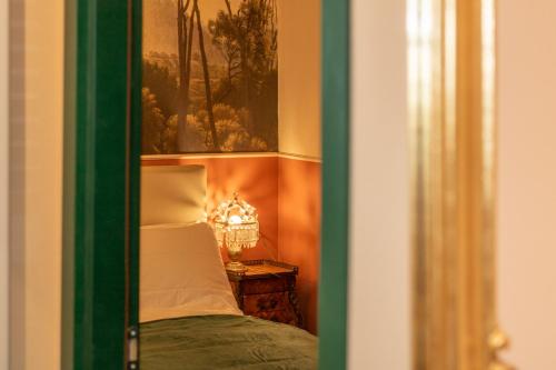 Katil atau katil-katil dalam bilik di Ariam Guesthouse
