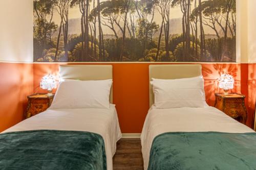 Katil atau katil-katil dalam bilik di Ariam Guesthouse