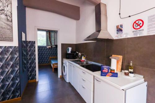 a kitchen with a sink and a counter top at casa dolce casa in Rome