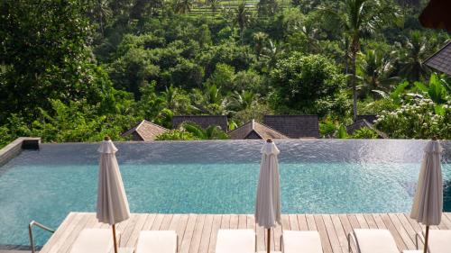 Der Swimmingpool an oder in der Nähe von Tejaprana Bisma - CHSE Certified