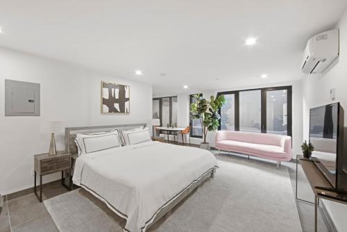 Ένα ή περισσότερα κρεβάτια σε δωμάτιο στο 149BK-101 New construction 2BR Private garden W-D