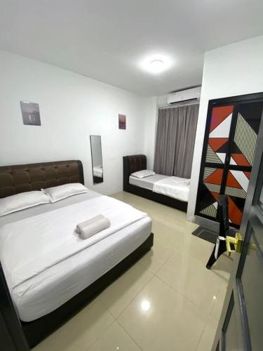 Cama o camas de una habitación en Hotel Casaria