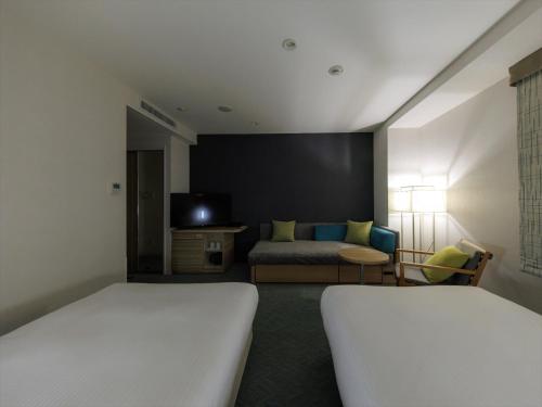 Katil atau katil-katil dalam bilik di JR Kyushu Hotel Kagoshima