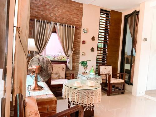 Sighma Handaru Guest House Syariahにあるシーティングエリア