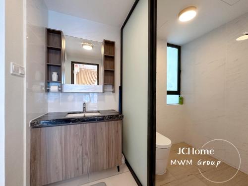 a bathroom with a sink and a toilet at Central Park Stay chill, stay here Netflix House JCHome by MWM in Johor Bahru