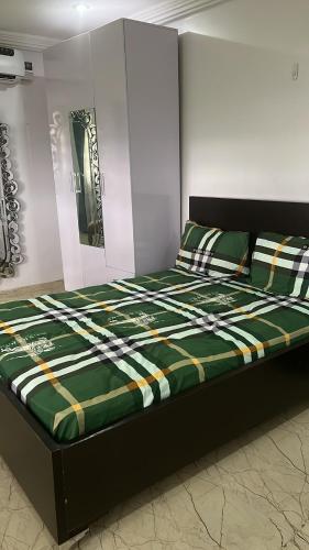 Postel nebo postele na pokoji v ubytování The Diasporan
