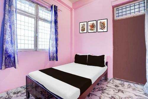 Katil atau katil-katil dalam bilik di Hotel O DPA