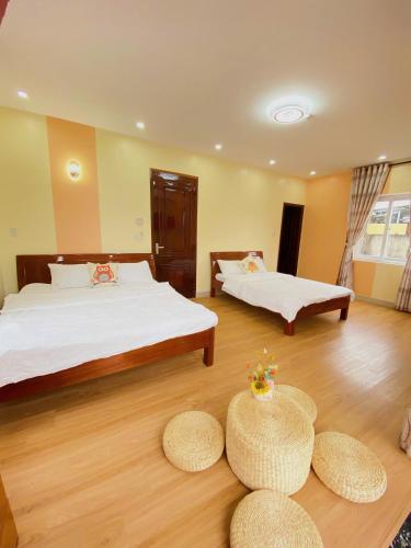 Ένα ή περισσότερα κρεβάτια σε δωμάτιο στο PU Homestay