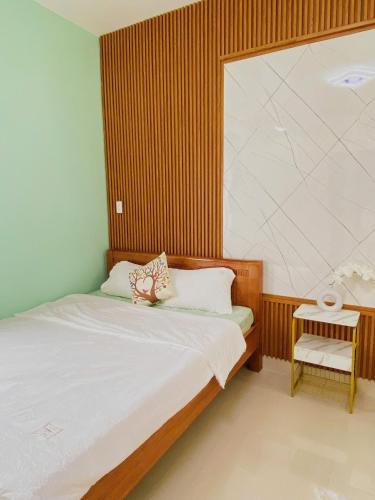 Ένα ή περισσότερα κρεβάτια σε δωμάτιο στο PU Homestay