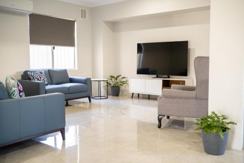 TV a/nebo společenská místnost v ubytování Seaside Haven Rockingham