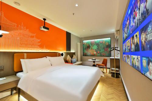 Voodi või voodid majutusasutuse Manji Yunfan Hotel Shenyang Zhongjie North Station Forbidden City Dashuaifu Branch toas