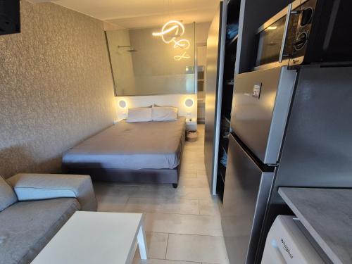Η κουζίνα ή μικρή κουζίνα στο Mastora Seaside Loft