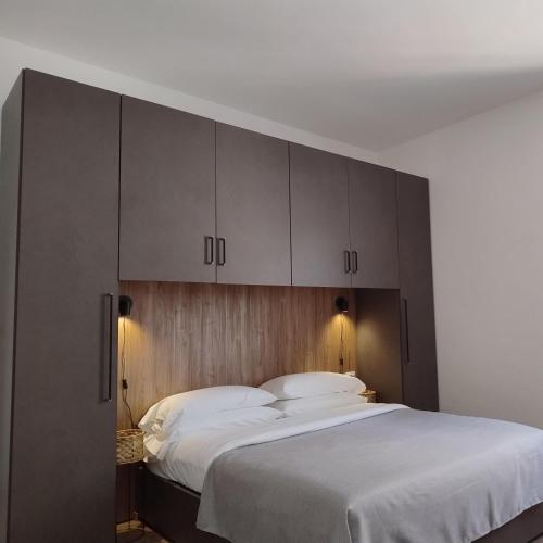Ένα ή περισσότερα κρεβάτια σε δωμάτιο στο Borgo Ragnitill