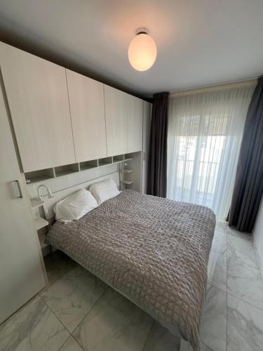 Postel nebo postele na pokoji v ubytování ALKA Luxury Penthouse Unit 11