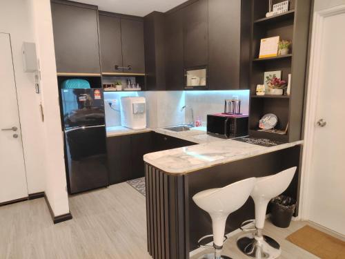 Kuchyň nebo kuchyňský kout v ubytování D&Q METROCITY GUESTHOUSE