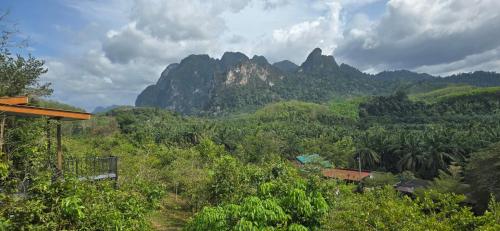 a view of a mountain with trees and mountains at Khao Sok Horizon in Ban Bang Thong