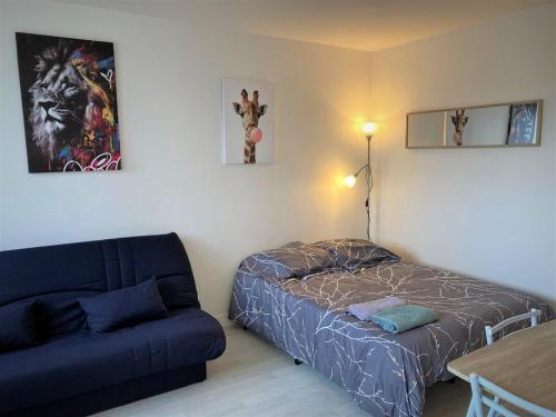 Ένα ή περισσότερα κρεβάτια σε δωμάτιο στο Appartement double 19 à Limoges