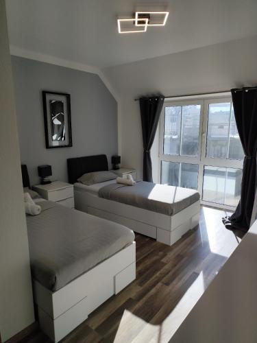 Ένα ή περισσότερα κρεβάτια σε δωμάτιο στο Gästezimmer Sarstedt