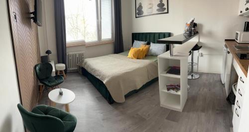 Postel nebo postele na pokoji v ubytování Moderní Apartmán v Děčíně