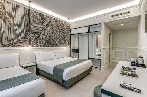 Ένα ή περισσότερα κρεβάτια σε δωμάτιο στο Relais Marco Polo