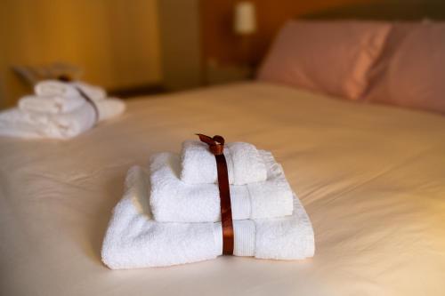 Postel nebo postele na pokoji v ubytování Apulia Concept B&B
