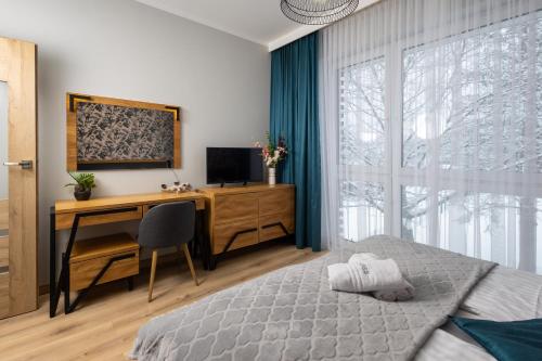 Postel nebo postele na pokoji v ubytování Apartament Ares - Beskid Apartment