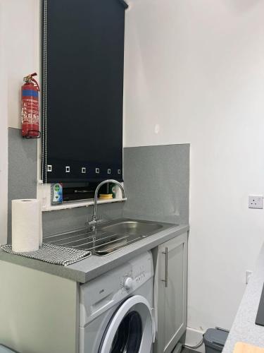 King Apartmentにあるキッチンまたは簡易キッチン