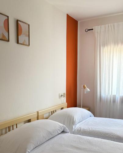 Postel nebo postele na pokoji v ubytování Una Finestra Sul Lago