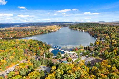 an aerial view of a lake in the fall at Cabin in the Skye - 5 BDs Lake Harmony in Lake Harmony