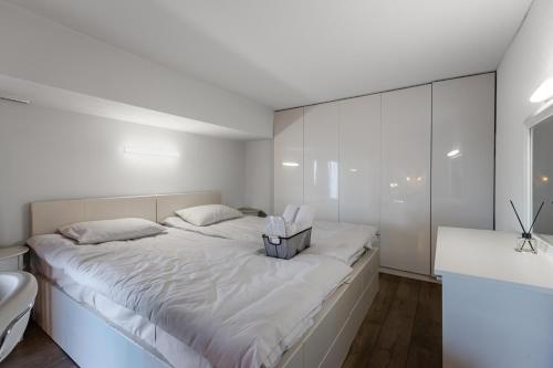 Postel nebo postele na pokoji v ubytování Vake Dream Duplex