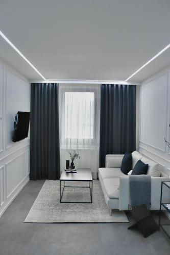 Χώρος καθιστικού στο Elvora Apartments