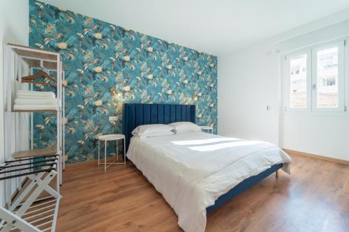 Postel nebo postele na pokoji v ubytování Zuli's Rooms