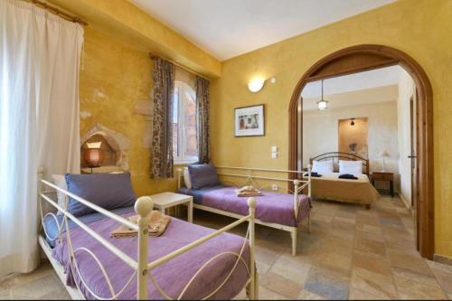 Ένα ή περισσότερα κρεβάτια σε δωμάτιο στο Elaiona Country Home