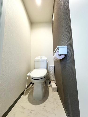 a bathroom with a white toilet in a room at K2 square 502 in Nagoya