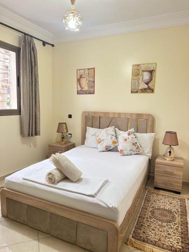 Postel nebo postele na pokoji v ubytování charming room close to Marrakech airport