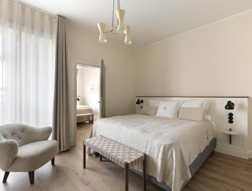 Postel nebo postele na pokoji v ubytování Hotel Búdir